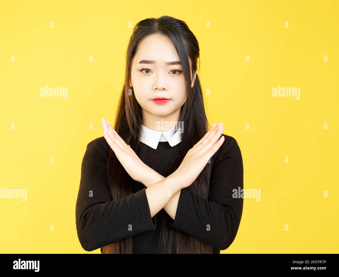 Weigerung der Frau Stop Gesture Verbot gekreuzte Hände Zeichen Stockfoto