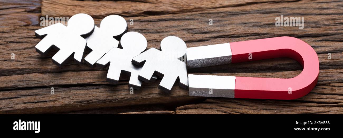 Gewinnen Sie Einen Mitarbeiter-Erfassungsmagneten. Personalbeschaffungsstrategie Stockfoto