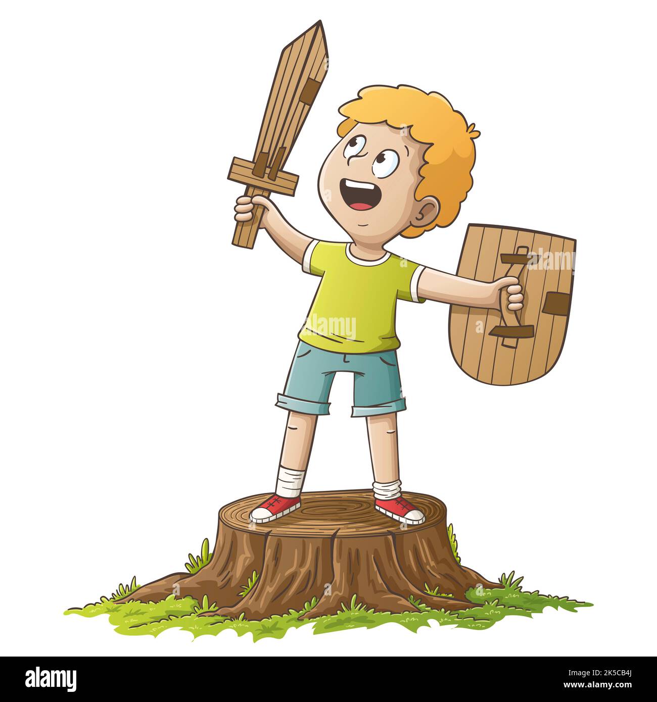Junge mit Schwert und Schild aus Pappe. Stockfoto