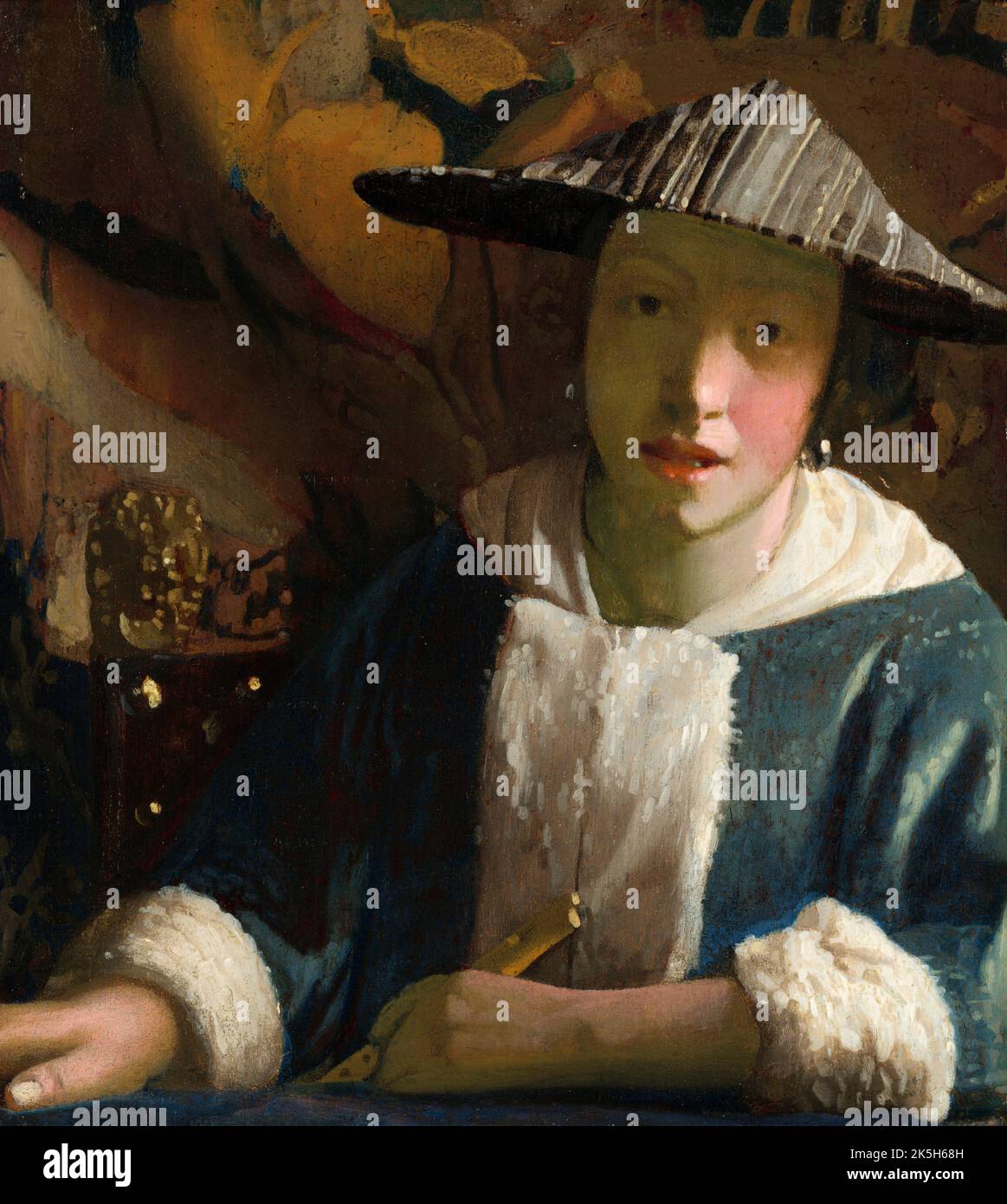 Mädchen mit einer Flöte. Johannes Vermeer. c. 1669/1675. Öl auf der Platte. Studio von Johannes Vermeer. Im Oktober 2022 wurde das Gemälde von der Washington National Gallery als von einem Familienmitglied oder einem Lehrling, der bei Vermeer studierte, neu eingestuft. Stockfoto