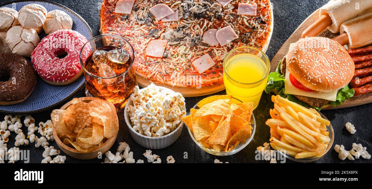 Lebensmittel, die das Krebsrisiko erhöhen. Junk Food Stockfoto