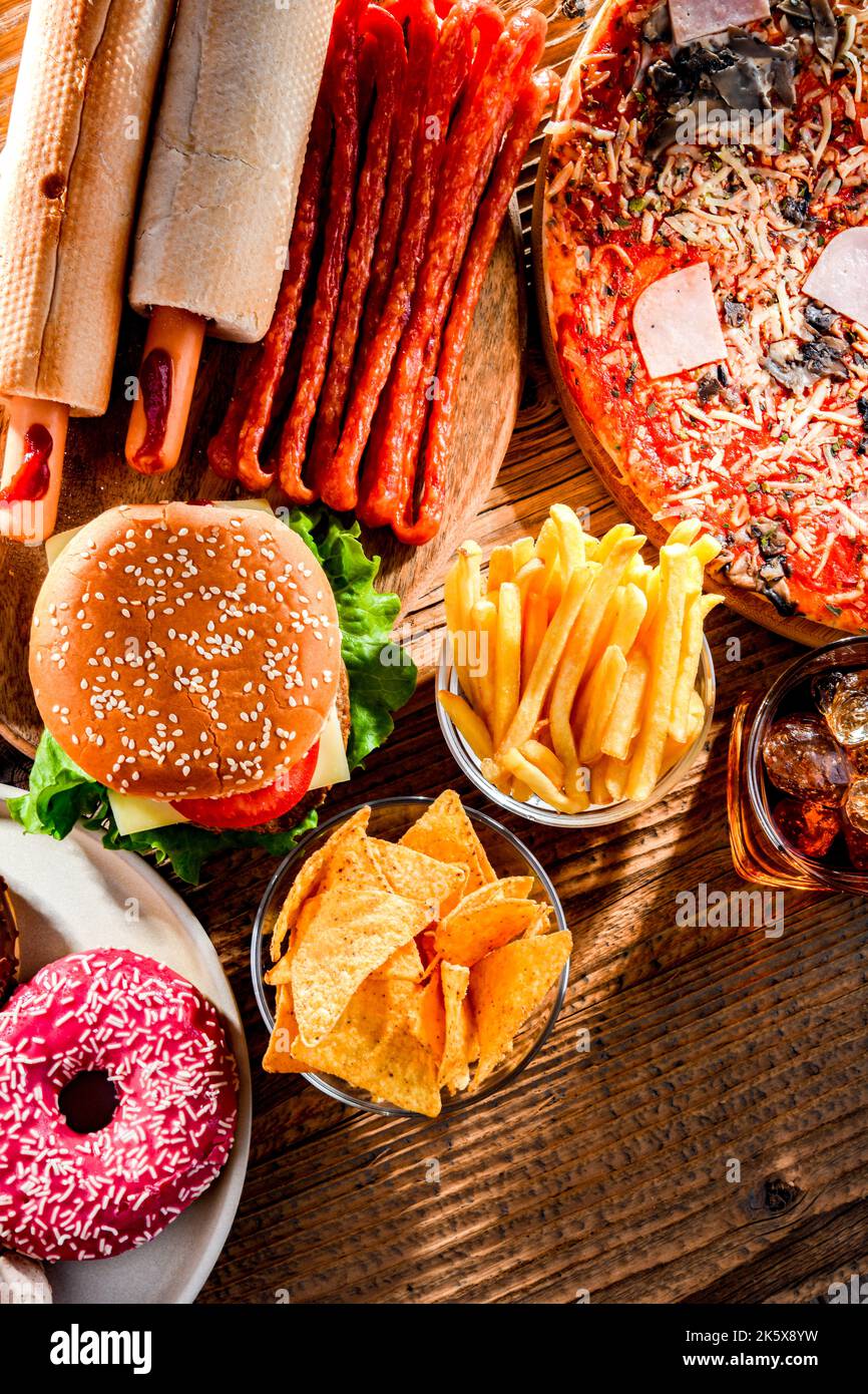 Lebensmittel, die das Krebsrisiko erhöhen. Junk Food Stockfoto