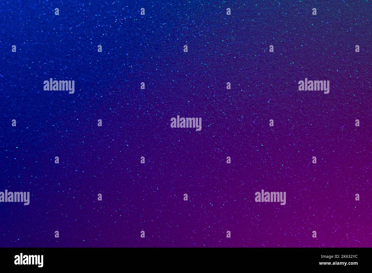 Fluoreszierender Hintergrund Glitzer Textur lila blau Stockfoto