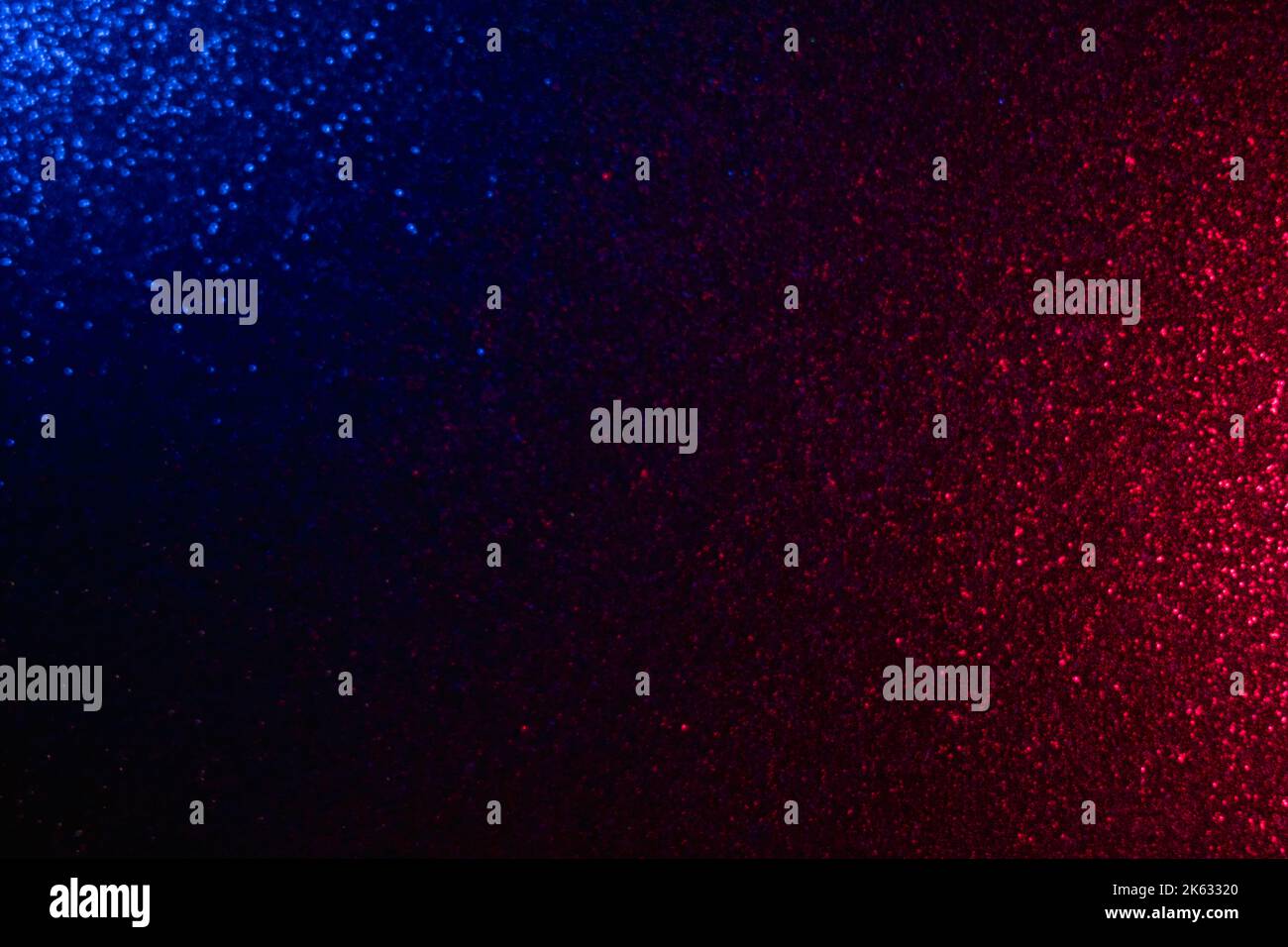 Verwischen Funken Hintergrund glänzend blau rot dunkel leuchten Stockfoto