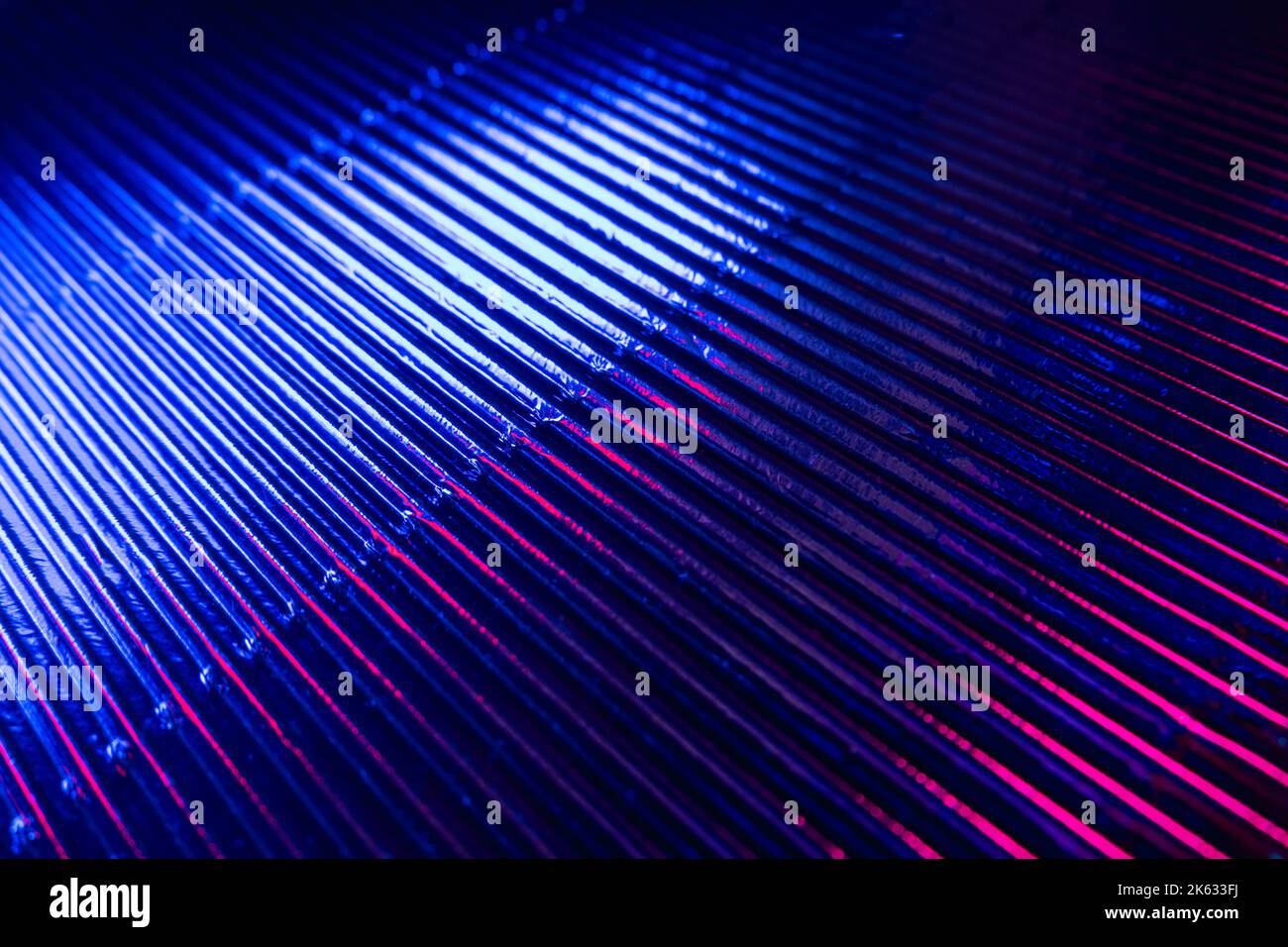 Futuristische Hintergrund gerillte Textur Neonfarbe Stockfoto