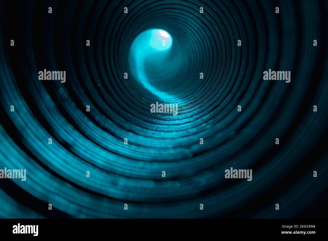 Neon Tunnel Blur leuchten Hintergrund Cyan blauen Kreisen Stockfoto
