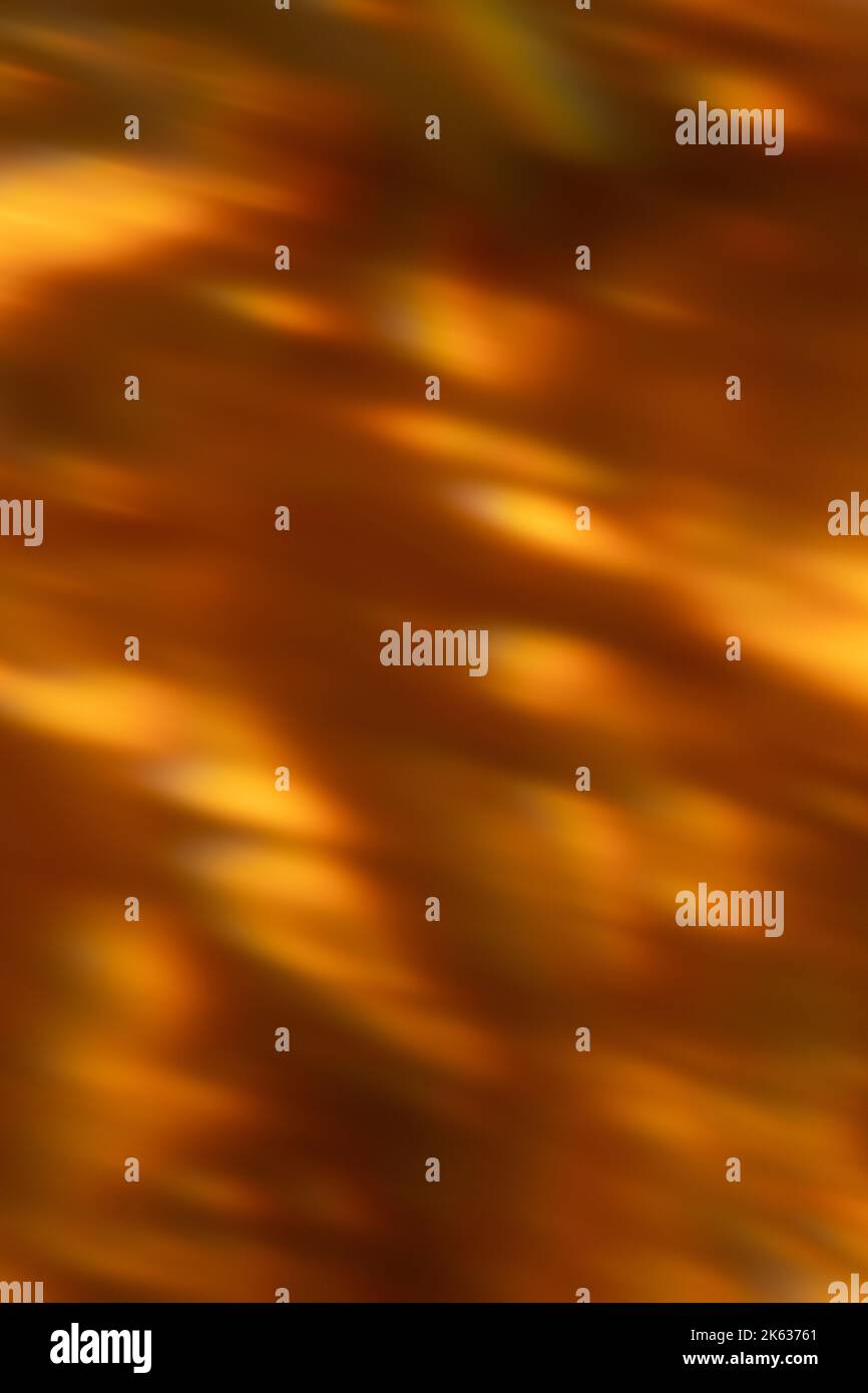 Blur von unscharfem Licht Unschärfe-Strahlen orange leuchten dunkel Stockfoto