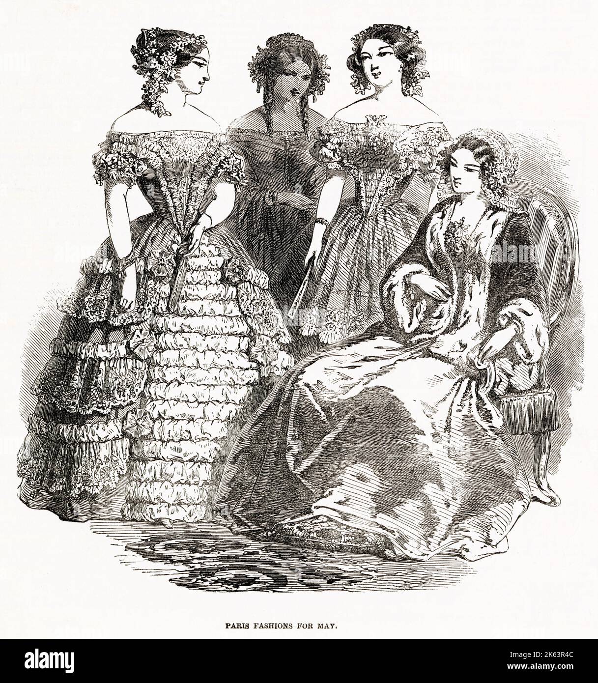 Vier Frauen verschwenden die neuesten Moden des 1850. Mai. Stockfoto