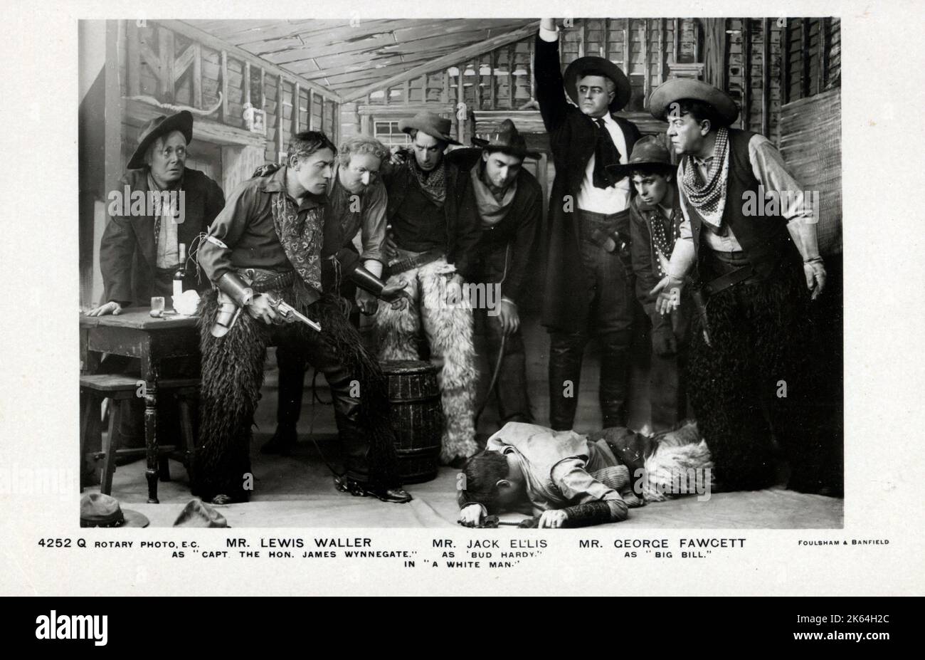 „A White man“ - spielen Sie im Lyric Theatre, London, mit (von links) Herrn Lewis Waller als „Captain der Ehrenmann James Wynnegate“, Herrn Jack Ellis als „Bud Hardy“ und Herrn George Fawcett als „Big Bill“. Stockfoto