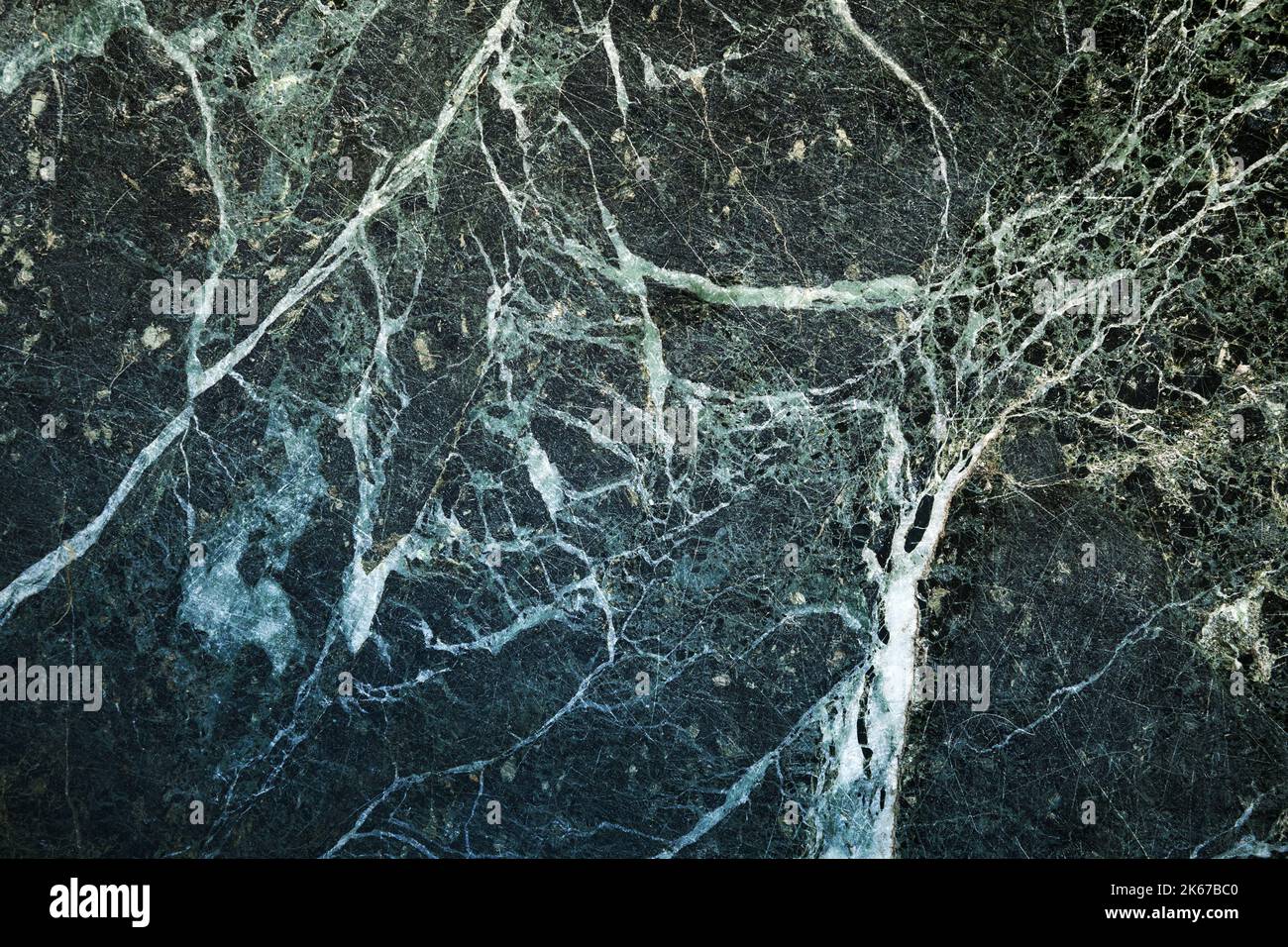 Abstrakte Hintergrund Foto Textur von natürlichen tiefgrünen Marmor Stein, Nahaufnahme, Vorderansicht Stockfoto