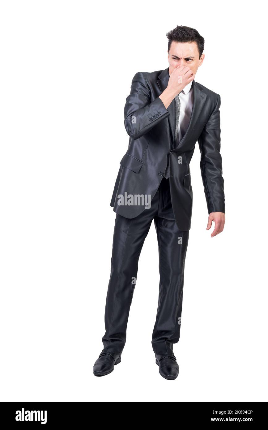 Geschäftsmann, der im Studio schlecht riecht. Weißer Hintergrund. Stockfoto
