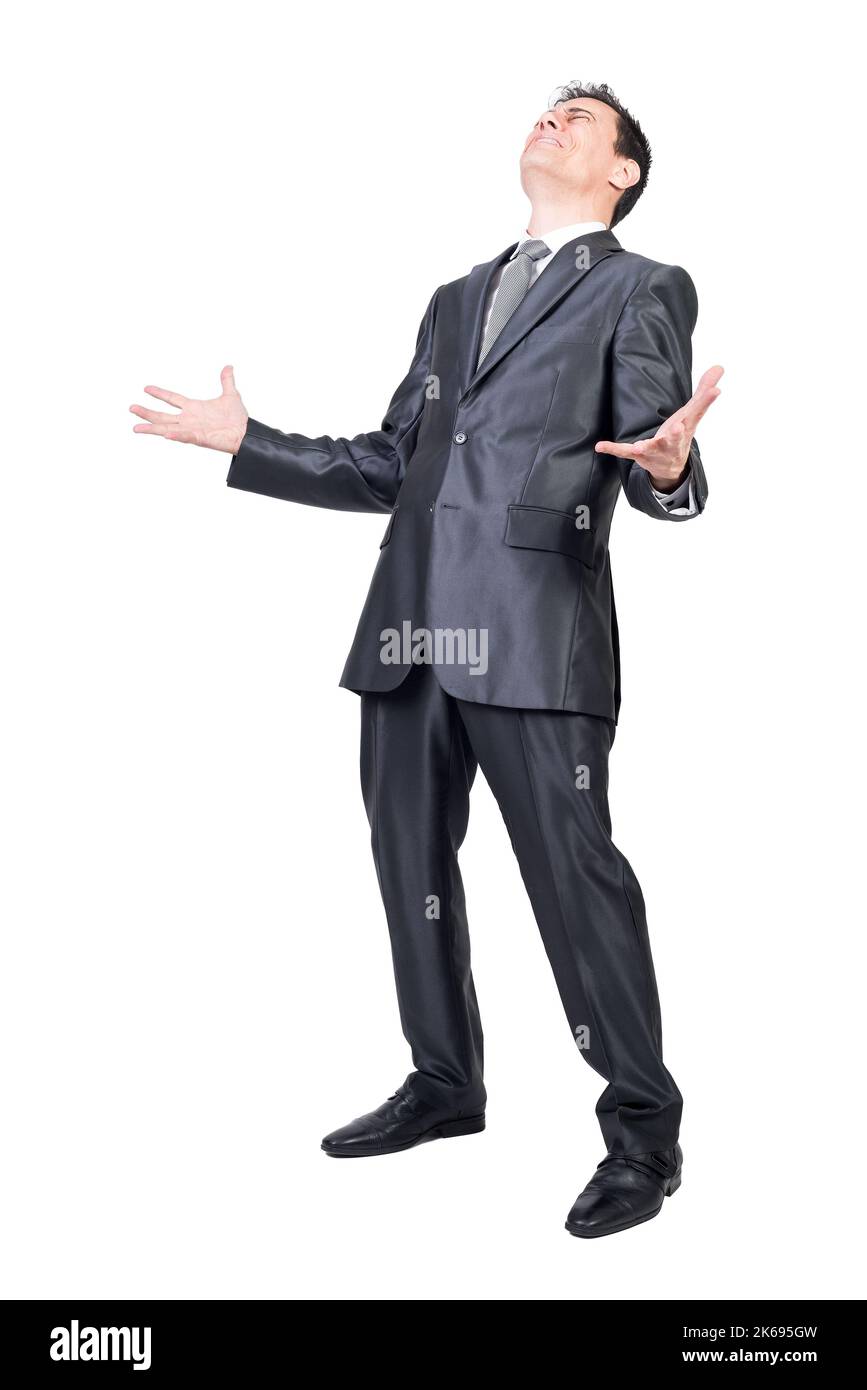 Verärgert männlicher Manager mit geschlossenen Augen im Studio Stockfoto