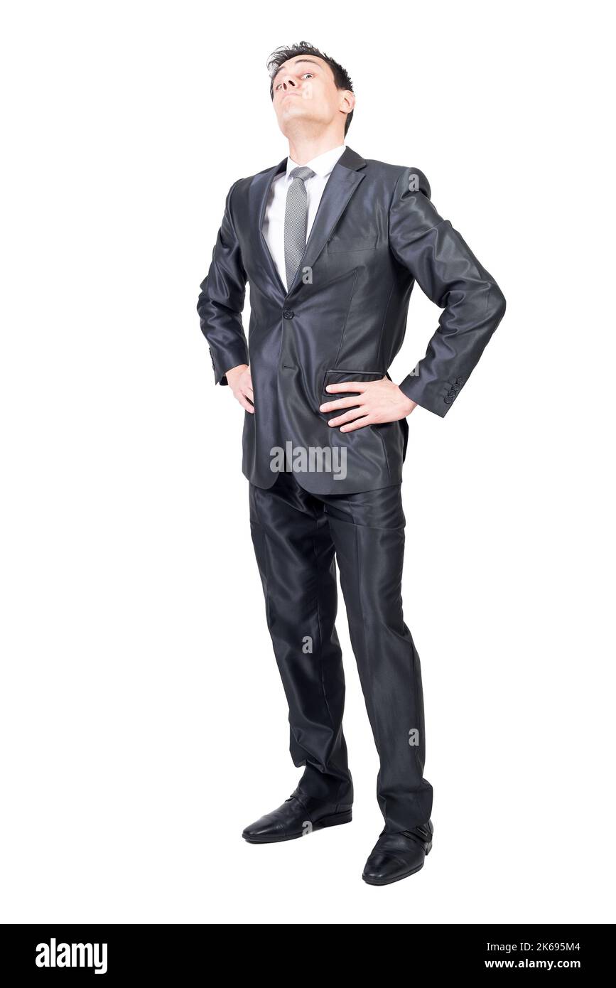 Selbstbewusster Geschäftsmann in elegantem Anzug mit Blick auf die Kamera Stockfoto
