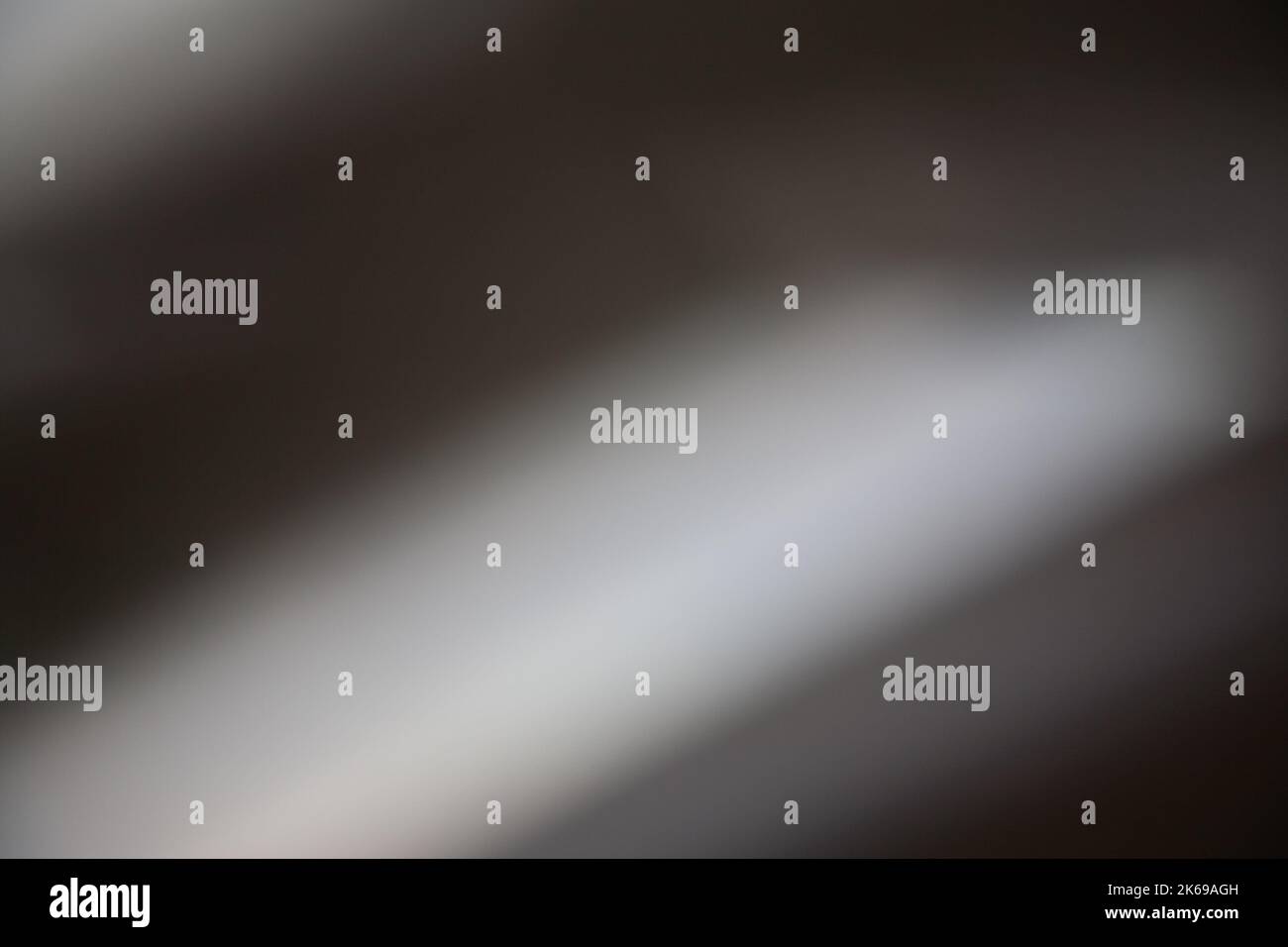 Unschärfe glühen Hintergrund Licht Leck braun weißen Strahlen Stockfoto