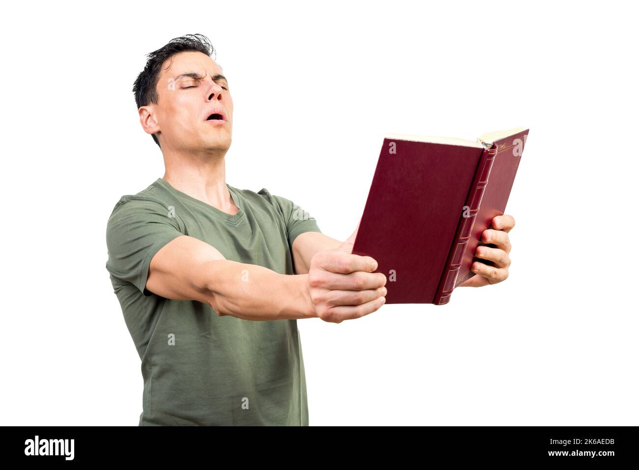 Mann mit Hyperopie-Schielen und Buch lesen Stockfoto