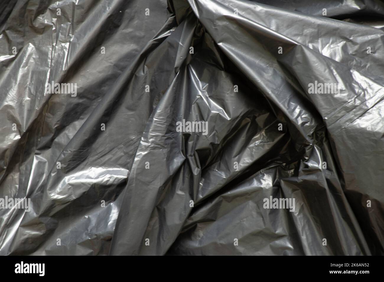 Schwarz zerknittert Film als Hintergrund, schwarz Paket für Hintergründe Stockfoto