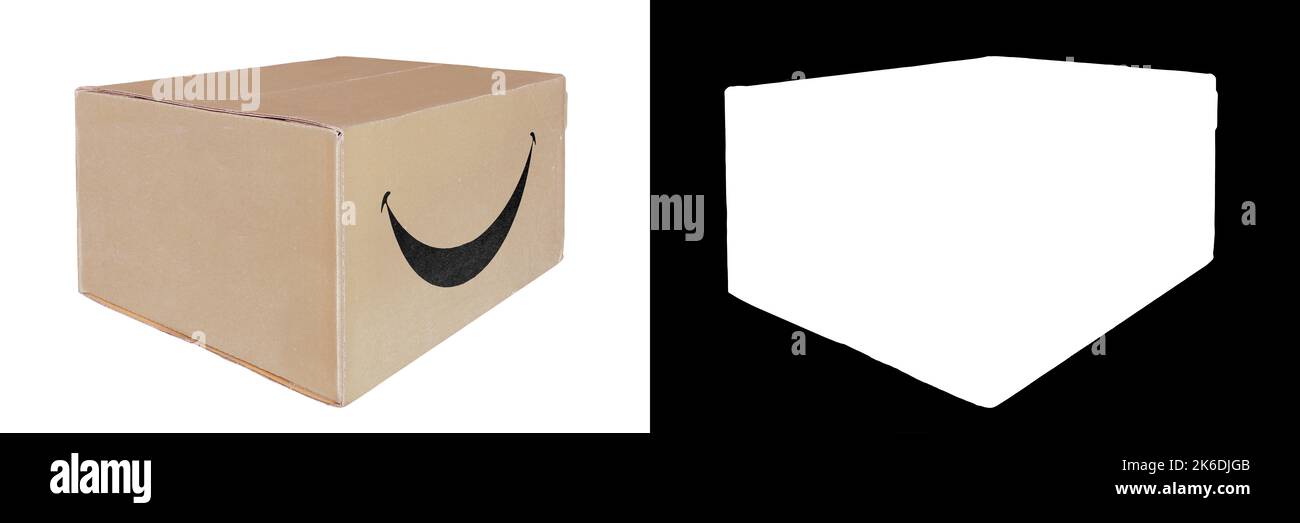 Geschlossener Karton mit einem Lächeln-Schild, isoliert auf weißem Hintergrund mit Clipping-Maske. Stockfoto