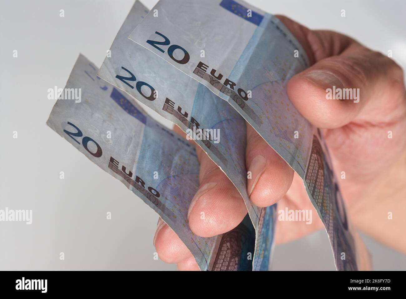 Hand abholen Euro-Scheine Stockfoto