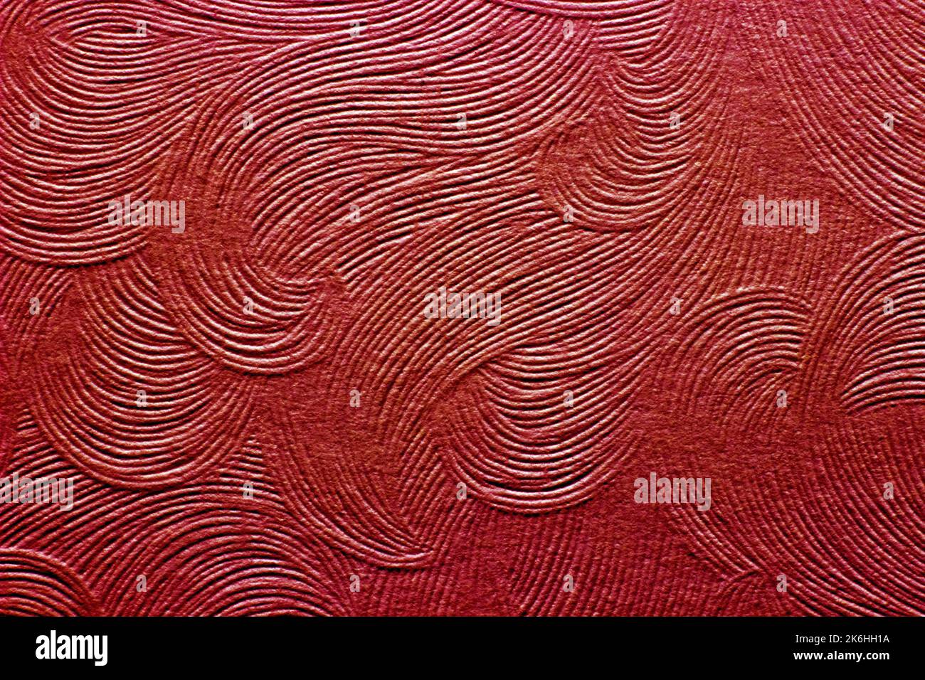Rote Welle mit Papiertextur. Weiche Fokus-Textur für den Hintergrund Stockfoto