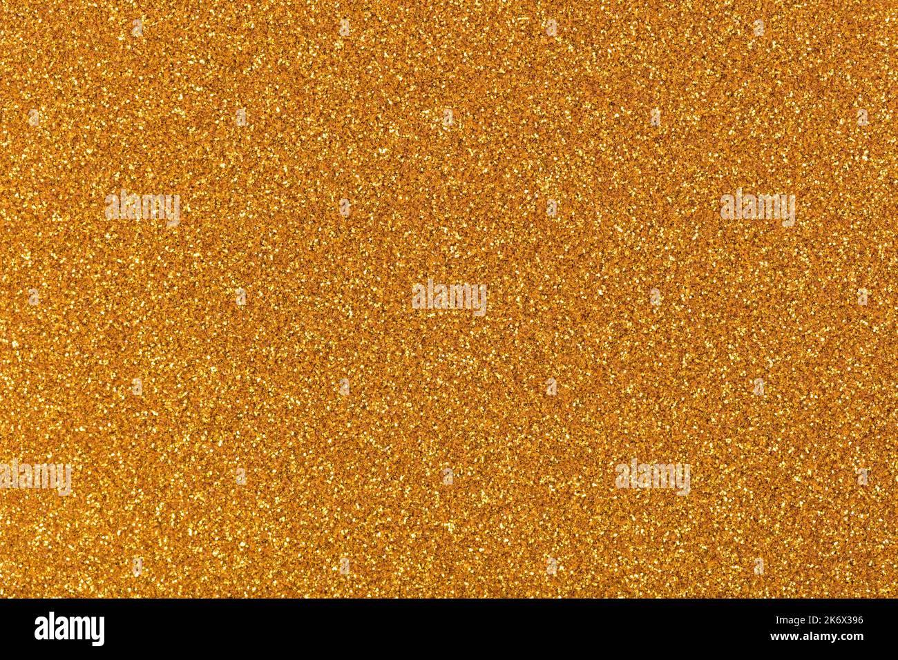 Glänzendes Gold Glitzer Hintergrund, neue Textur für eleganten Stil. Glitzernde Lichter festlicher Hintergrund mit Textur. Abstrakt Weihnachten funkelte hell Stockfoto
