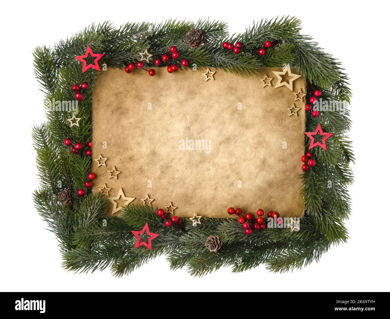 Weihnachtskarte mit klassischem Pergamentpapier, eingerahmt von Tannenzweigen Stockfoto