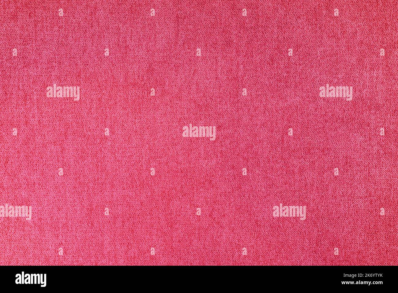 Textur Hintergrund aus Velours rosa Stoff. Stoff Textur von Polstermöbeln Textil-Material, Design-Interieur, Wanddekor. Stofftextur in der Nähe Stockfoto