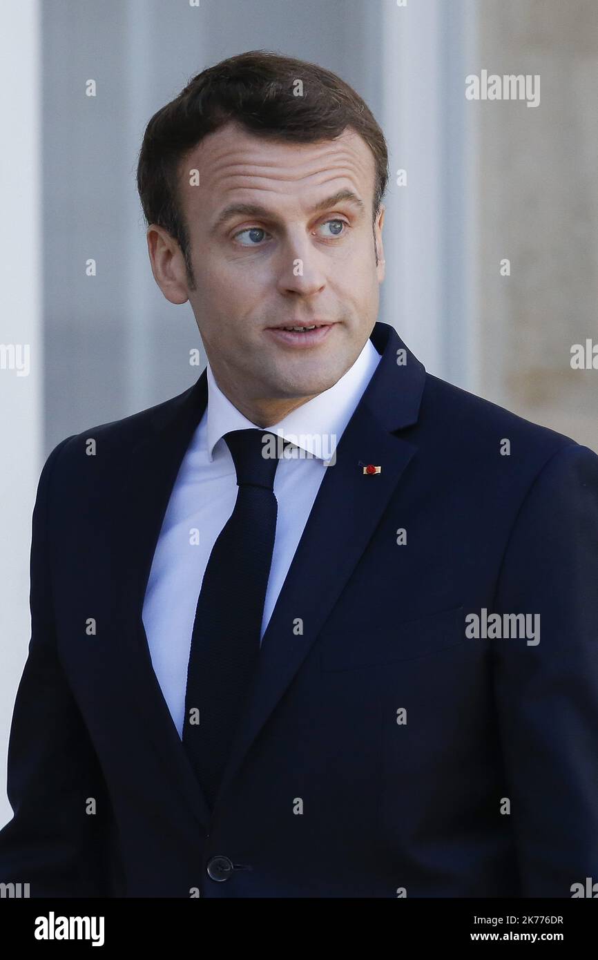 Der französische Präsident Emmanuel Macron kehrt nach dem hochrangigen Treffen zu den Herausforderungen des Multilateralismus mit dem chinesischen Präsidenten, der deutschen Kanzlerin und dem Präsidenten der Europäischen Kommission in Paris, Frankreich, in den Elysee-Palast zurück. 26.03.2019 Stockfoto