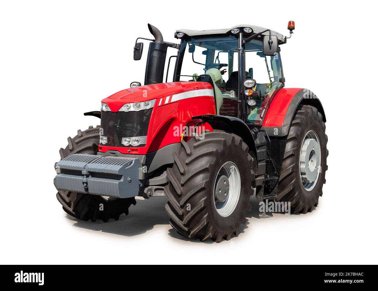 Neuer roter Traktor auf weißem Hintergrund isoliert, mit Abschneideweg Stockfoto