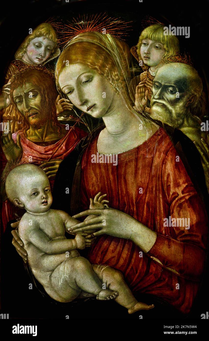 Madonna und Kind mit Engeln und Johannes der Täufer und Hl. Hieronymus.  ca. 1460-70 Matteo di Giovanni 1430 – 1495 Siena italienischen Renaissance-Künstler von der Sieneser Schule. Stockfoto