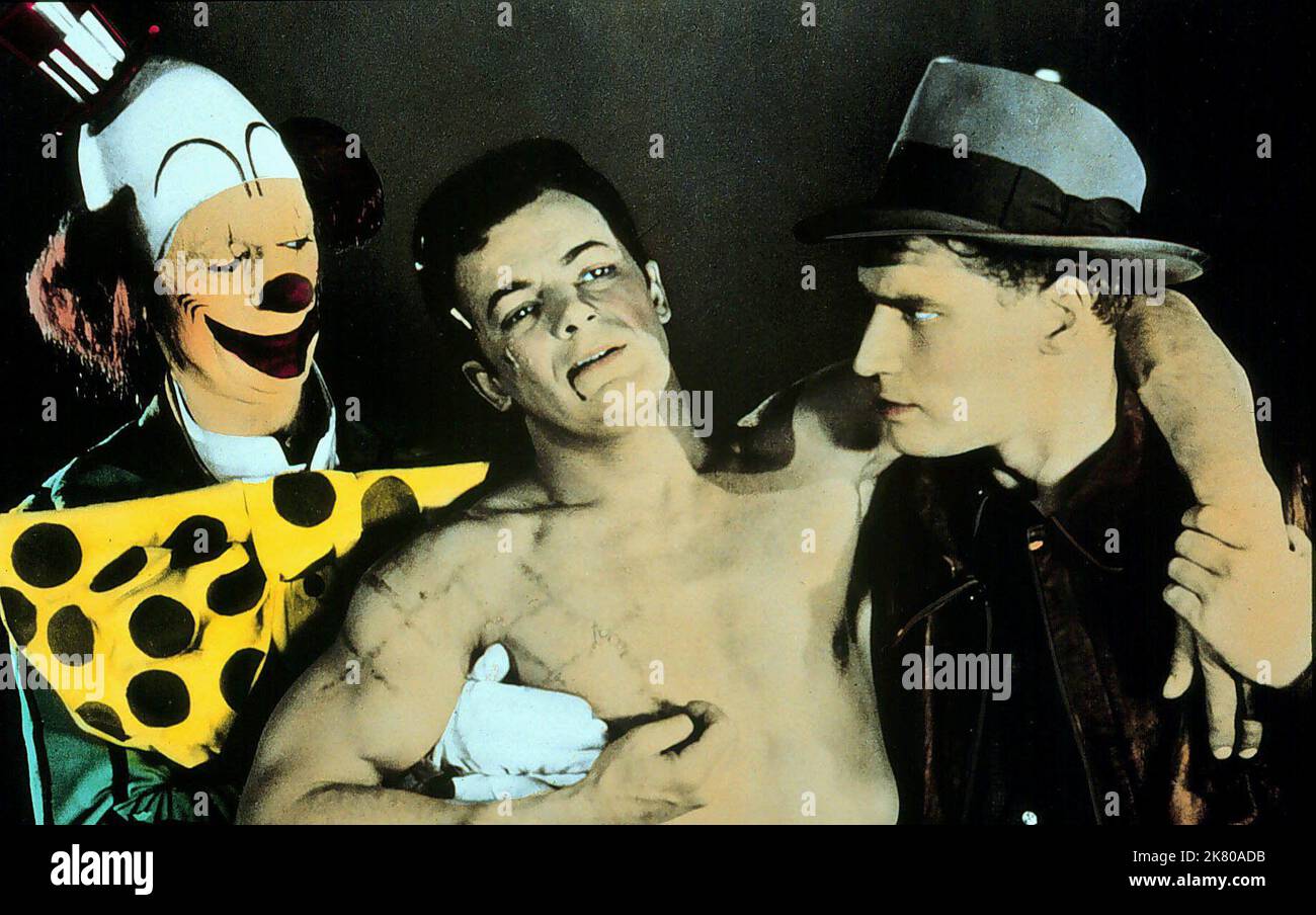 James Stewart, Cornel Wilde & Charlton Heston Film: The Greatest Show on Earth (1952) Charaktere: 'Buttons' A Clown,The Great Sebastian & Brad Braden Regie: Cecil B. DeMille 10 January 1952 **WARNUNG** Dieses Foto ist nur für den redaktionellen Gebrauch bestimmt und unterliegt dem Copyright von PARAMOUNT PICTURES und/oder des Fotografen, der von der Film- oder Produktionsfirma beauftragt wurde und darf nur von Publikationen im Zusammenhang mit der Bewerbung des oben genannten Films reproduziert werden. Eine obligatorische Gutschrift für PARAMOUNT-BILDER ist erforderlich. Der Fotograf sollte auch bei Bekanntwerden des Fotos gutgeschrieben werden. Mit kann keine kommerzielle Nutzung gewährt werden Stockfoto