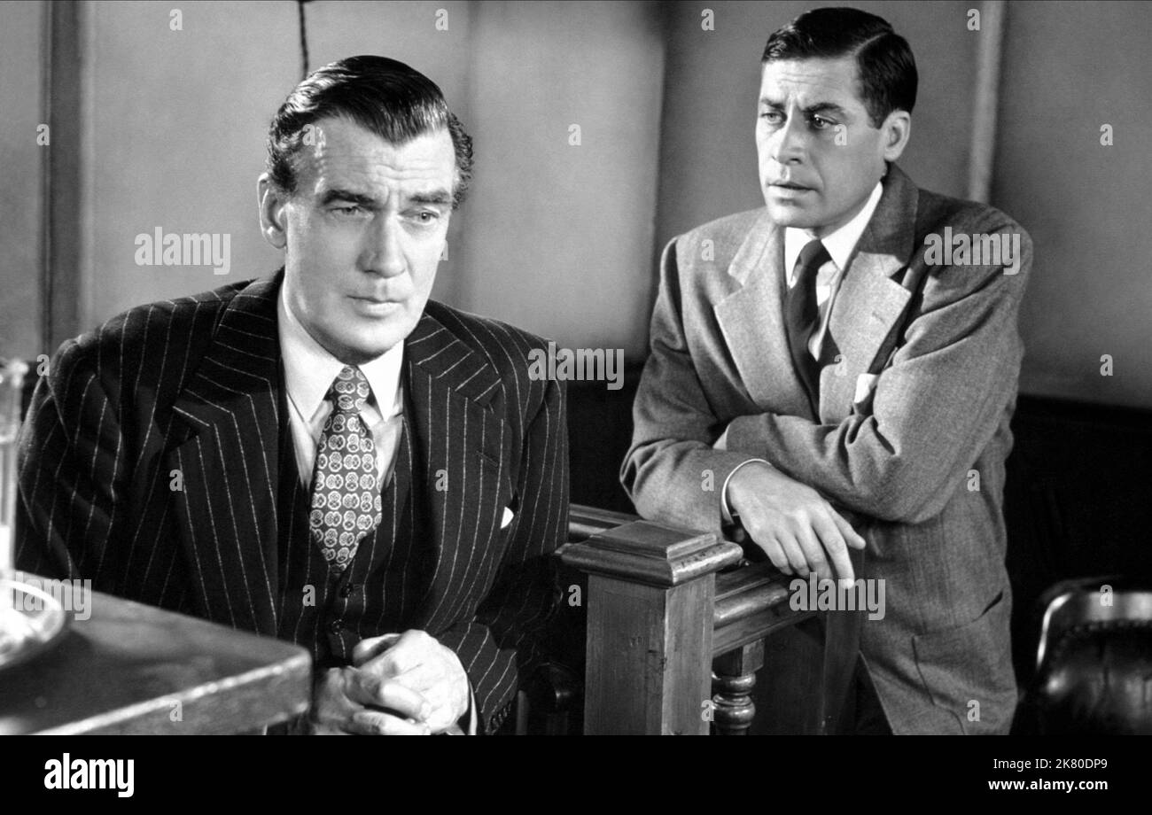Walter Pidgeon & John Hodiak Film The Sellout (1958) Charaktere: Haven D. Allridge, Chick Johnson Regie: Gerald Mayer 30. Mai 1952 **WARNUNG** dieses Foto ist nur für redaktionelle Zwecke bestimmt und unterliegt dem Copyright von METRO-GOLDWYN-MAYER und/oder dem Fotografen, der von der Film- oder Produktionsgesellschaft beauftragt wurde. Es ist eine obligatorische Gutschrift für METRO-GOLDWYN-MAYER erforderlich. Der Fotograf sollte ebenfalls angerechnet werden, wenn er bekannt ist. Ohne schriftliche Genehmigung der Film Company kann keine kommerzielle Nutzung gewährt werden. Stockfoto