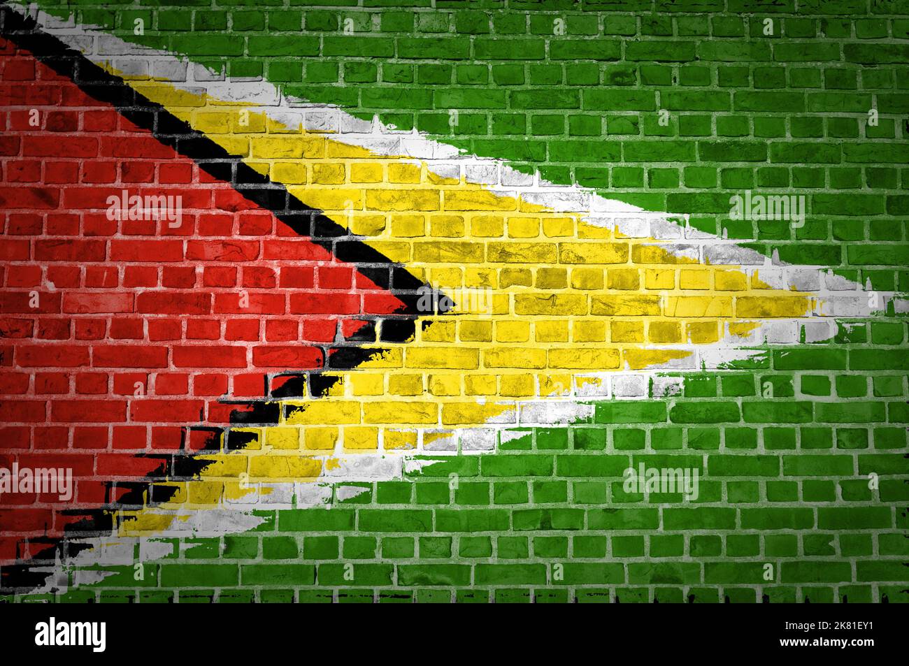 Ein Bild der Guyana Flagge gemalt auf eine Mauer in innerstädtischer Lage Stockfoto