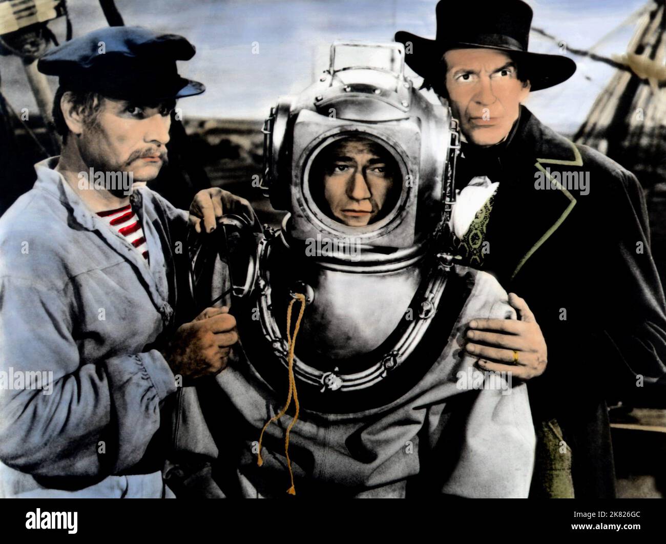 John Wayne & Raymond Massey Film: Reap the Wild Wind (USA 1942) Charaktere: Captain Jack Stuart & King Cutler / Verfilmung eines Zeitungsartikels (basierend auf Einer Saturday Evening Post Story von Thelma Strabel) Regie: Cecil B. DeMille 18 March 1942 **WARNUNG** Dieses Foto ist nur für den redaktionellen Gebrauch bestimmt und unterliegt dem Copyright von PARAMOUNT PICTURES und/oder des Fotografen, der von der Film- oder Produktionsfirma beauftragt wurde und darf nur von Publikationen im Zusammenhang mit der Bewerbung des oben genannten Films reproduziert werden. Eine obligatorische Gutschrift für PARAMOUNT-BILDER ist erforderlich. Der Fotograf sollte auch credi sein Stockfoto