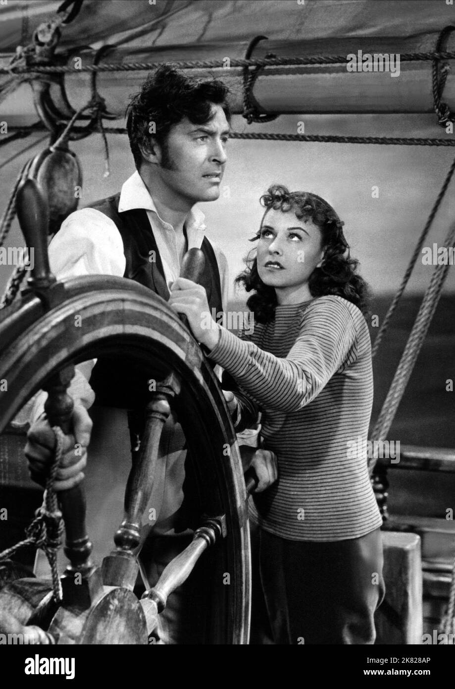 Ray Milland & Paulette Goddard Film: Reap the Wild Wind (USA 1942) Charaktere: Mr. Stephen 'Steve' Tolliver, Loxi Claiborne / Verfilmung eines Zeitungsartikels (basierend auf Einer Saturday Evening Post Story von Thelma Strabel) Regie: Cecil B. DeMille 18 March 1942 **WARNUNG** Dieses Foto ist nur für den redaktionellen Gebrauch bestimmt und unterliegt dem Copyright von PARAMOUNT PICTURES und/oder des Fotografen, der von der Film- oder Produktionsfirma beauftragt wurde und darf nur von Publikationen im Zusammenhang mit der Bewerbung des oben genannten Films reproduziert werden. Eine obligatorische Gutschrift für PARAMOUNT-BILDER ist erforderlich. Der Fotograf sollte es tun Stockfoto