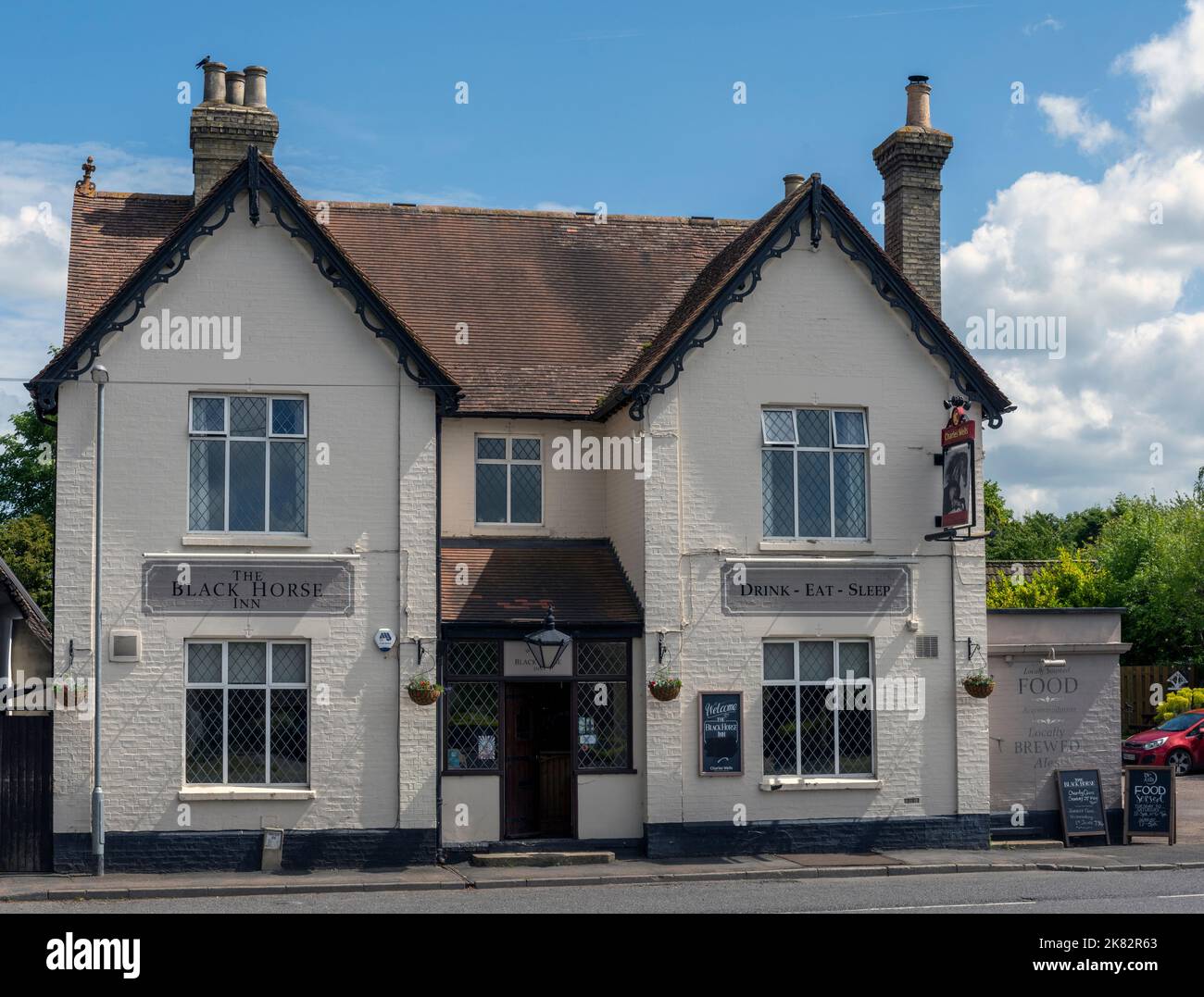 The Black Horse Inn - ein öffentliches Haus von Charles Wells - High Street, Swaffham Bulbeck, Cambridgeshire, England, Großbritannien Stockfoto