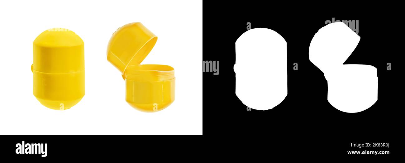 Gelbe Überraschungskapsel, eiförmig, isoliert auf weißem Hintergrund mit Clipping Maske und Pfad Stockfoto