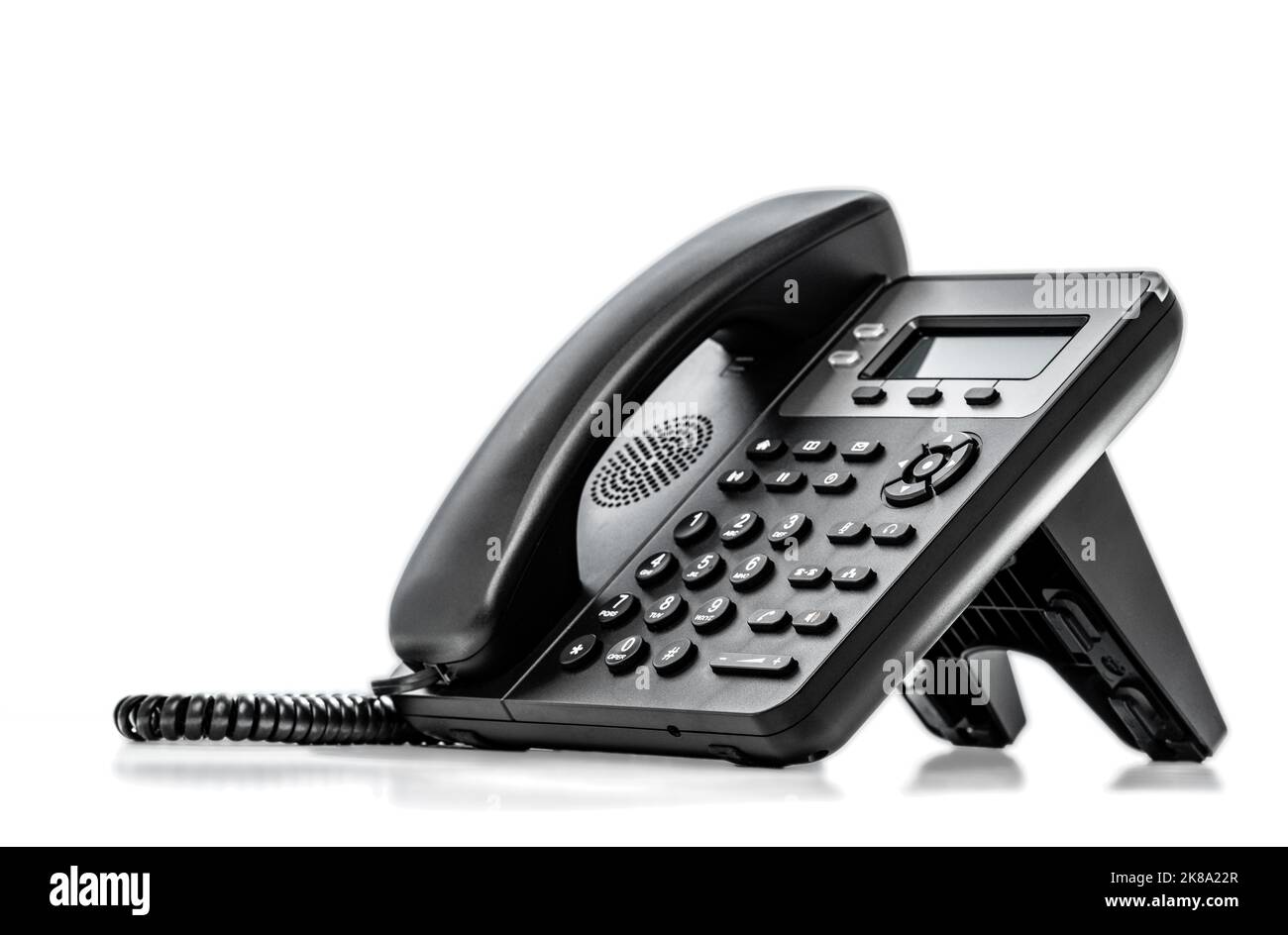 Telefon mit VOIP isoliert auf weißem Hintergrund. Kundendienst-Support, Call Center-Konzept. Modernes VoIP-Telefon. Kommunikationsunterstützung, Call Center Stockfoto