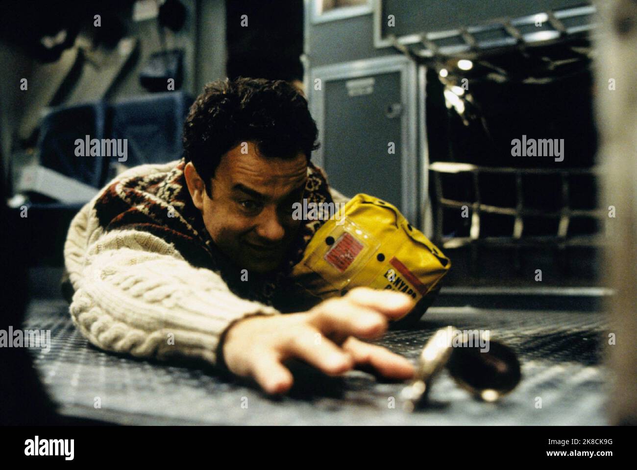 Tom Hanks Film: Cast Away (USA 2000) Charaktere: Chuck Noland Regie: Robert Zemeckis 07 December 2000 **WARNUNG** Dieses Foto ist nur für redaktionelle Zwecke bestimmt und unterliegt dem Copyright von DREAMWORKS SKG und/oder des Fotografen, der von der Film- oder Produktionsfirma beauftragt wurde und darf nur von Publikationen im Zusammenhang mit der Bewerbung des oben genannten Films reproduziert werden. Eine obligatorische Gutschrift an DREAMWORKS SKG ist erforderlich. Der Fotograf sollte auch bei Bekanntwerden des Fotos gutgeschrieben werden. Ohne schriftliche Genehmigung der Film Company kann keine kommerzielle Nutzung gewährt werden. Stockfoto