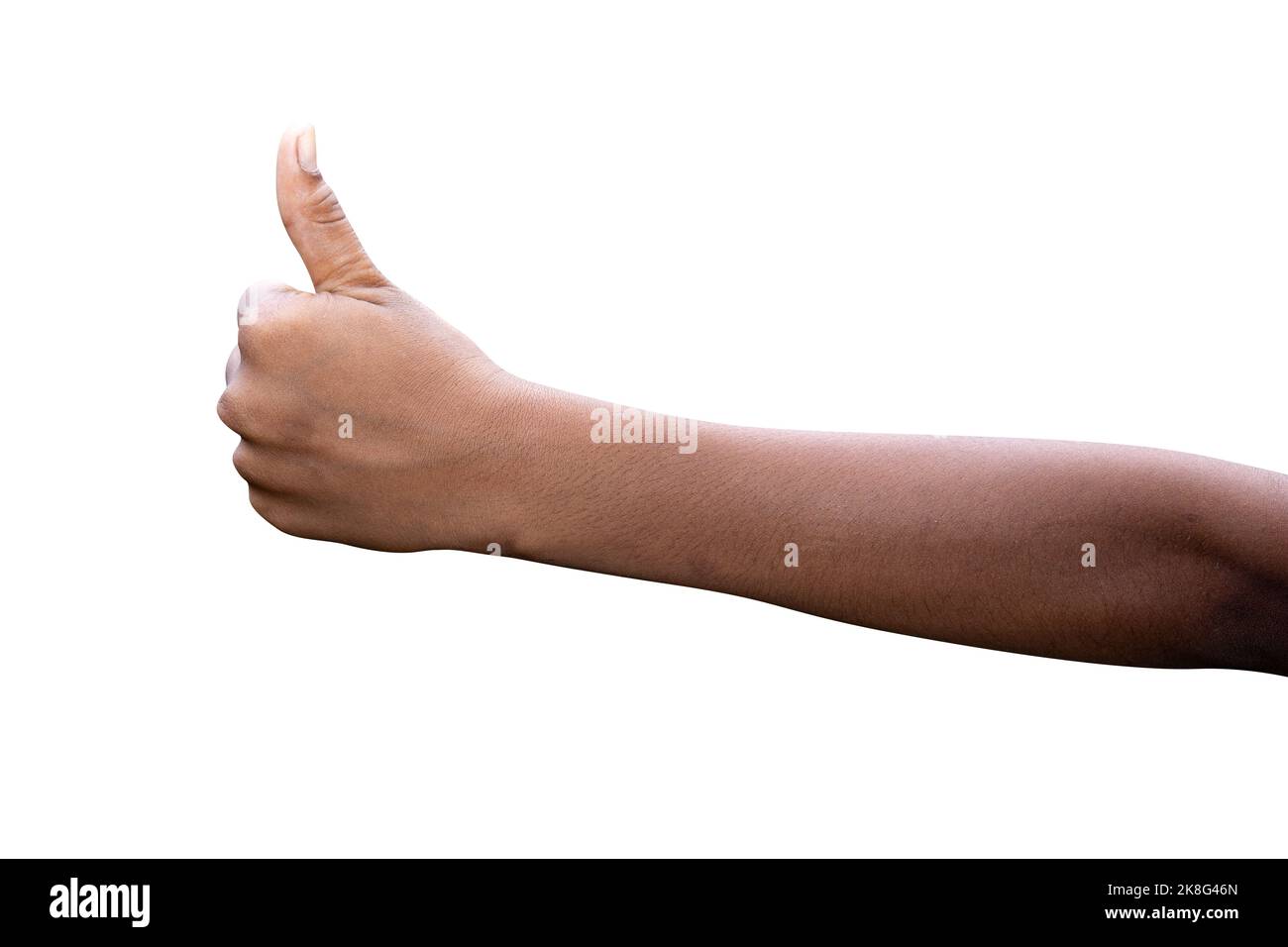 Nahaufnahme der männlichen Hand zeigt Daumen hoch Zeichen vor weißem Hintergrund Stockfoto