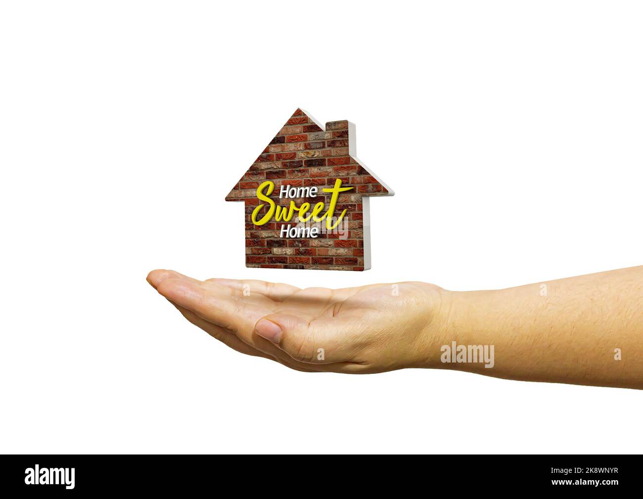 3D Abbildung einer Hand, die eine Ikone eines Hauses hält. Home Sweet Home in auf isoliertem weißen Hintergrund Stockfoto