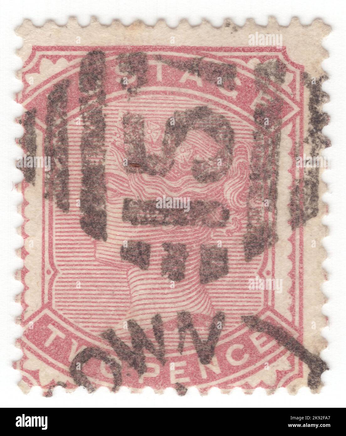 VEREINIGTES KÖNIGREICH - 1880: Eine 2 Pence lilac-Rose Briefmarke, die das Porträt von Königin Victoria zeigt Stockfoto