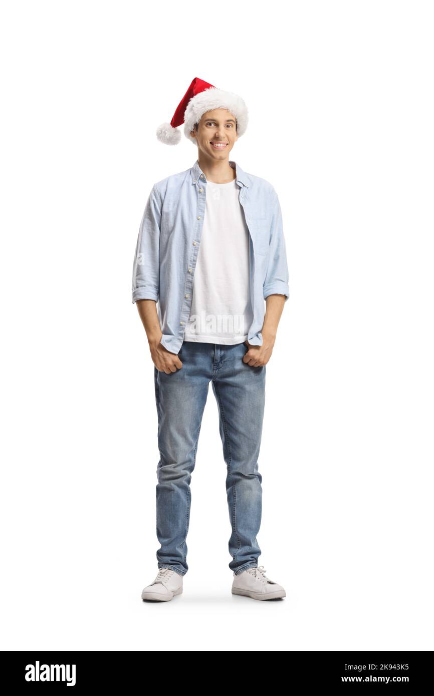 Lässiger junger Mann, der einen weihnachtsmann-Hut auf weißem Hintergrund trägt Stockfoto