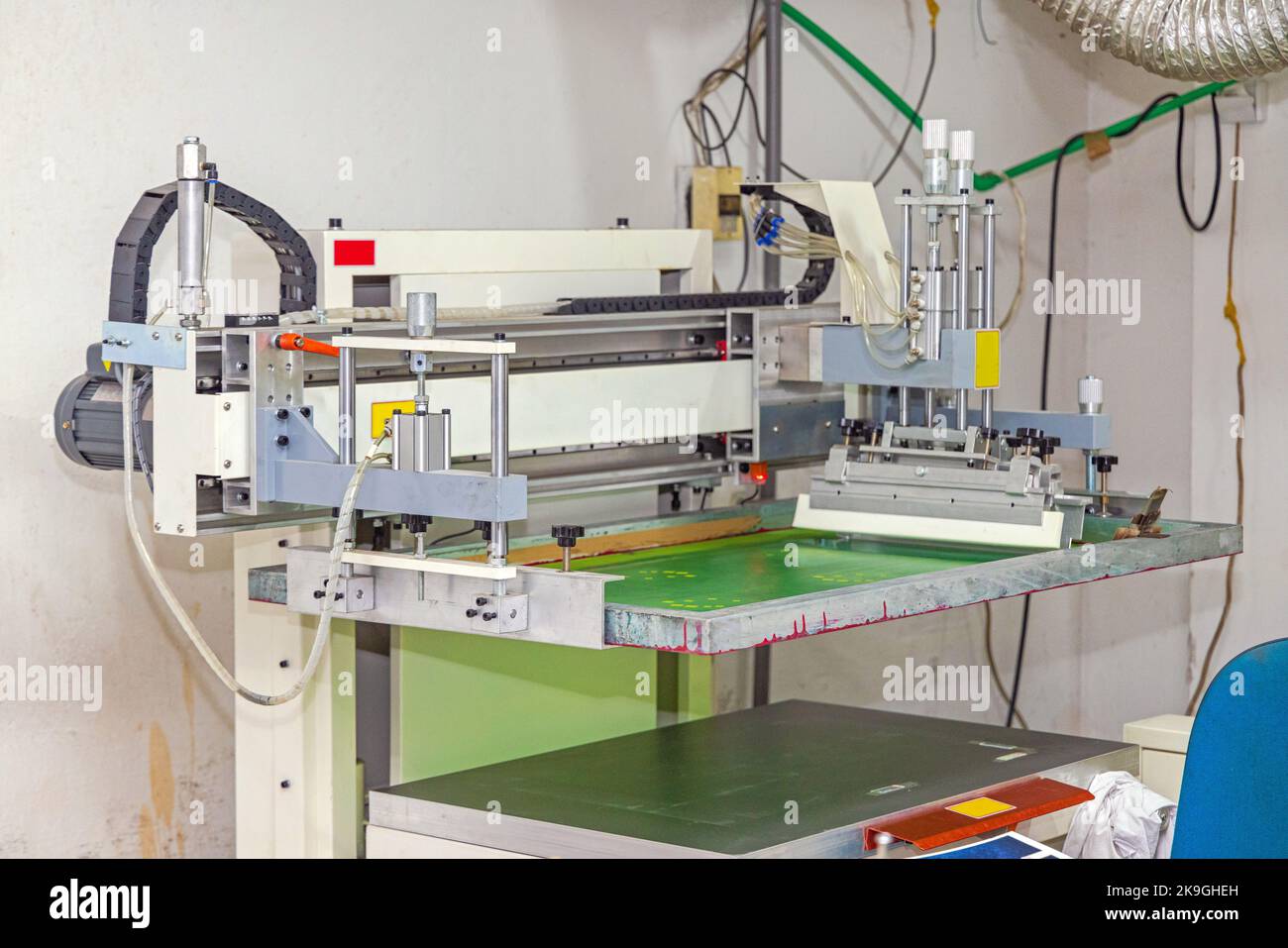 Automatisierte Siebdruckmaschine Print Office Stockfoto