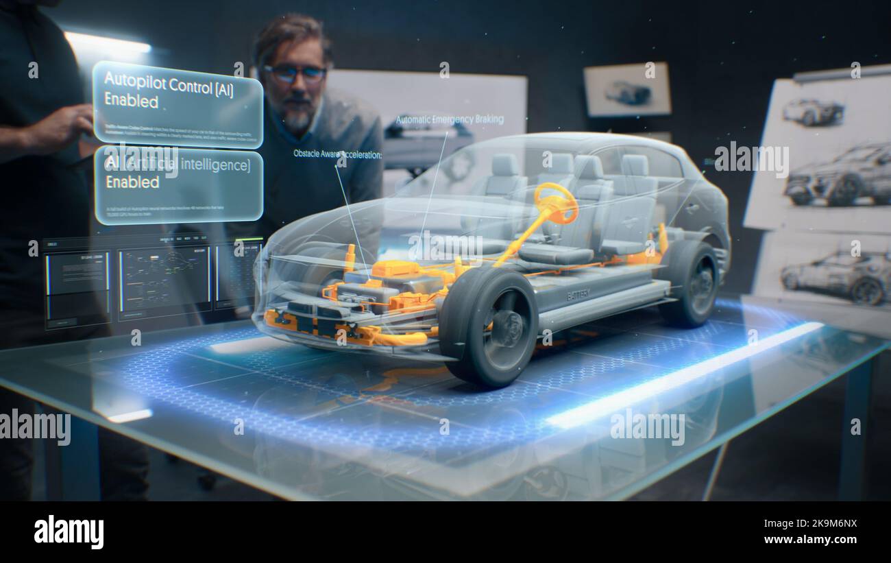 Entwicklungsingenieure testen das fahrerlose Autopilotsystem, das in ein Elektroauto mit künstlicher KI integriert ist. Sie nutzen innovative, innovative 3D-Modellierungstechnologie der Visualisierung Stockfoto