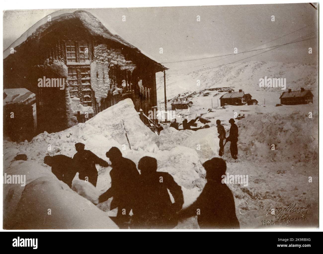 Schneeräumung an der Gütermagazinbahn an der Landesgrenze. Stockfoto