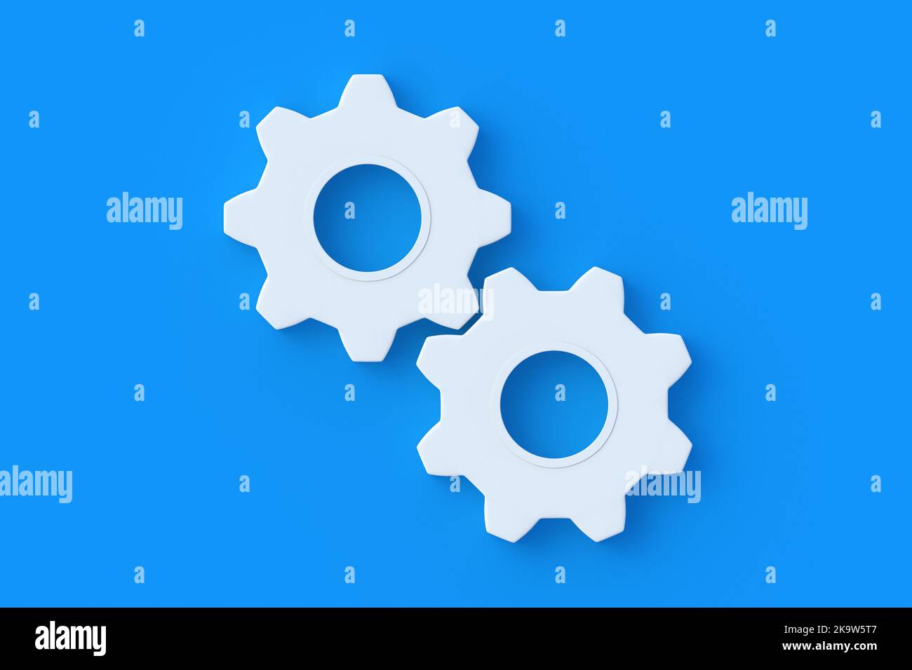 Zahnräder auf blauem Hintergrund. Engineering-Technologie. Entwicklung von Mechanismen. Industrieller Fortschritt. Ideenkonzept. Geschäftliche Zusammenarbeit. Teamarbeit und Kommunikation Stockfoto