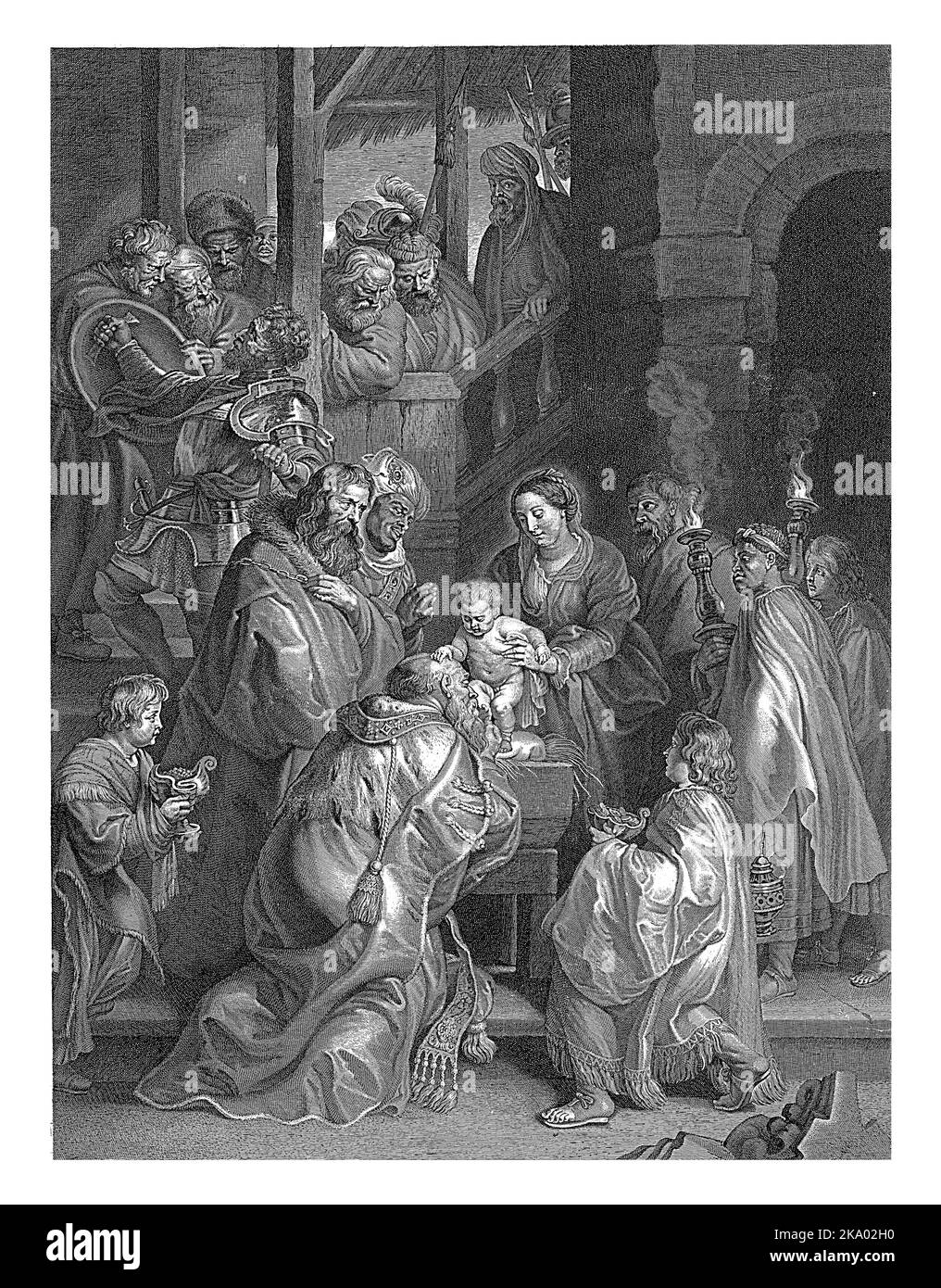 Maria hält das Christuskind, damit der knieende König seinen Fuß küssen kann. Zwei Jungen im Vordergrund. Die beiden anderen Könige sind rechts in Anbetung Stockfoto