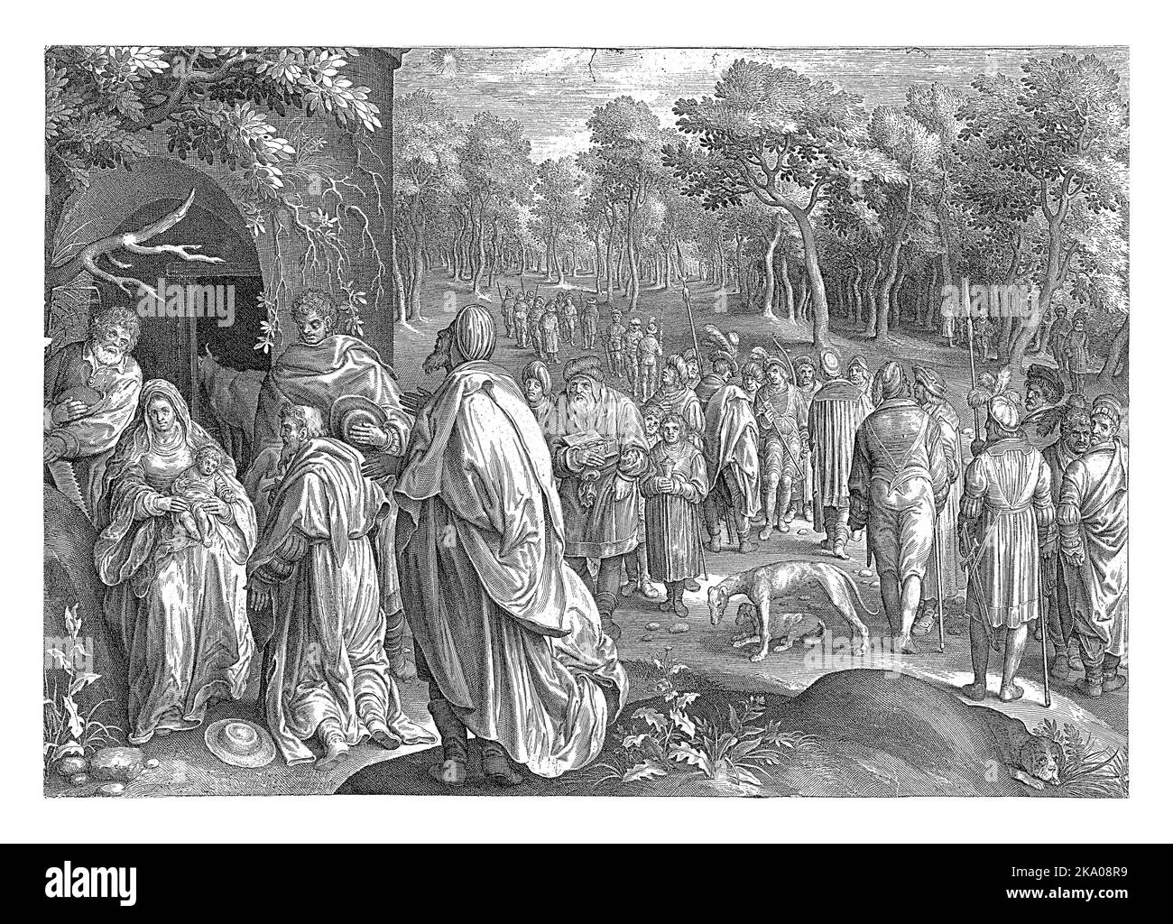 Ein Stall in einer bewaldeten Landschaft. Im linken Vordergrund zeigen Maria und Josef den drei Weisen das Christuskind. Im Hintergrund Mitglieder der thei Stockfoto