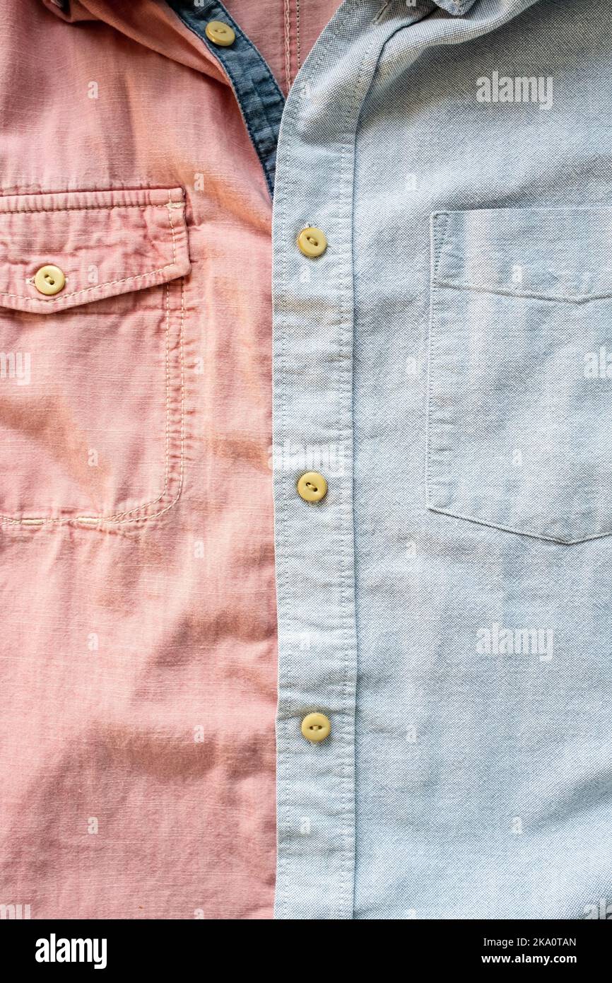 Verschiedene Hemden werden zusammen geknöpft. Stoffhintergrund in rosa und grau. Für Text platzieren. Flatley. Stockfoto