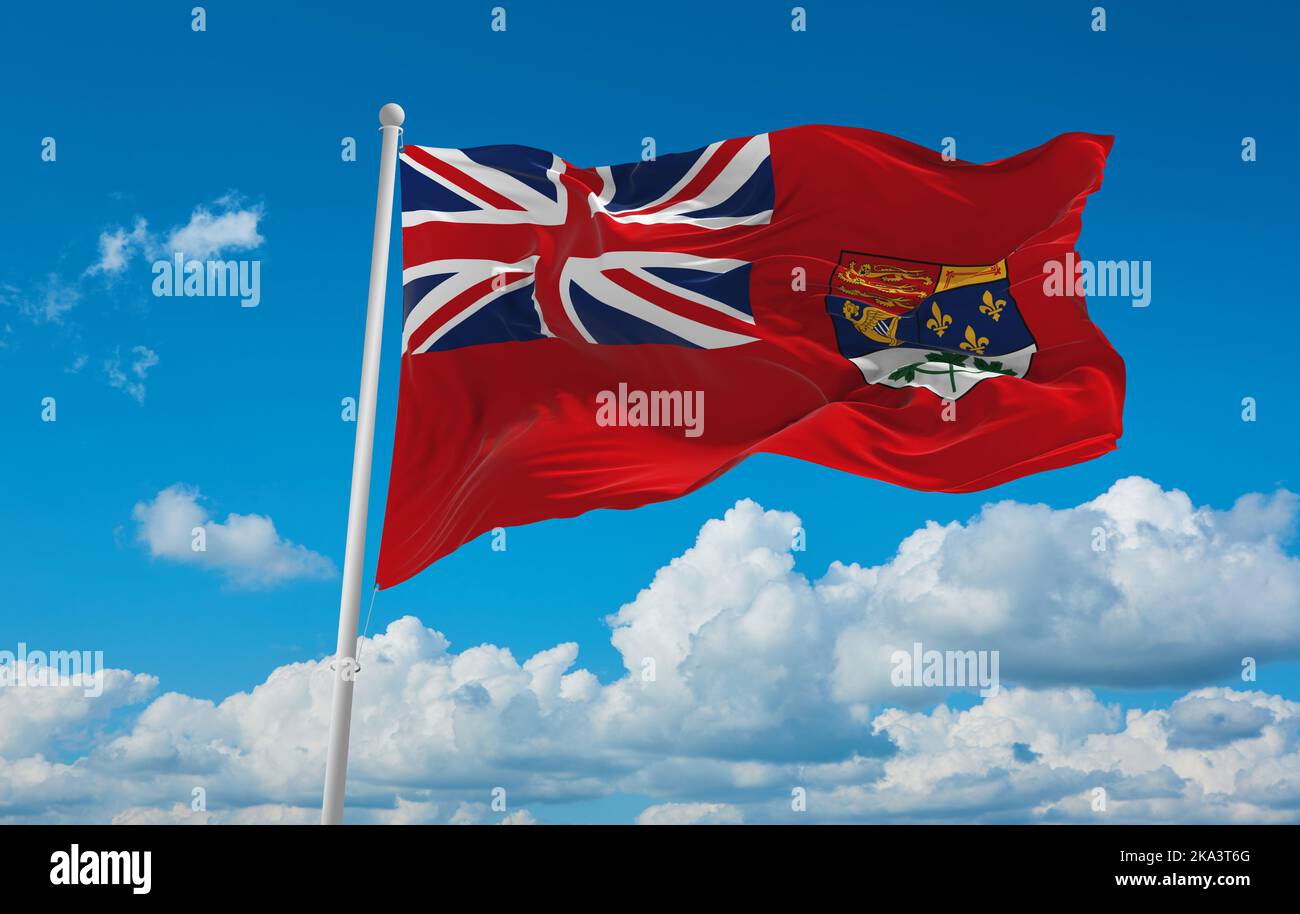 Flagge britisch-irischer Abstammung englischer Kanadier bei wolkiger Himmelshintergrund, Panoramablick. Flagge, die ethnische Gruppe oder Kultur repräsentiert, regionale Autorinnen Stockfoto